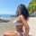 (ФОТО) Лидија Вукиќевиќ ужива на плажа во Охрид, позира во бело бикини кое едвај ги задржува бујните гради